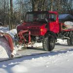 U1300L with a Frink 10' highway plow. 